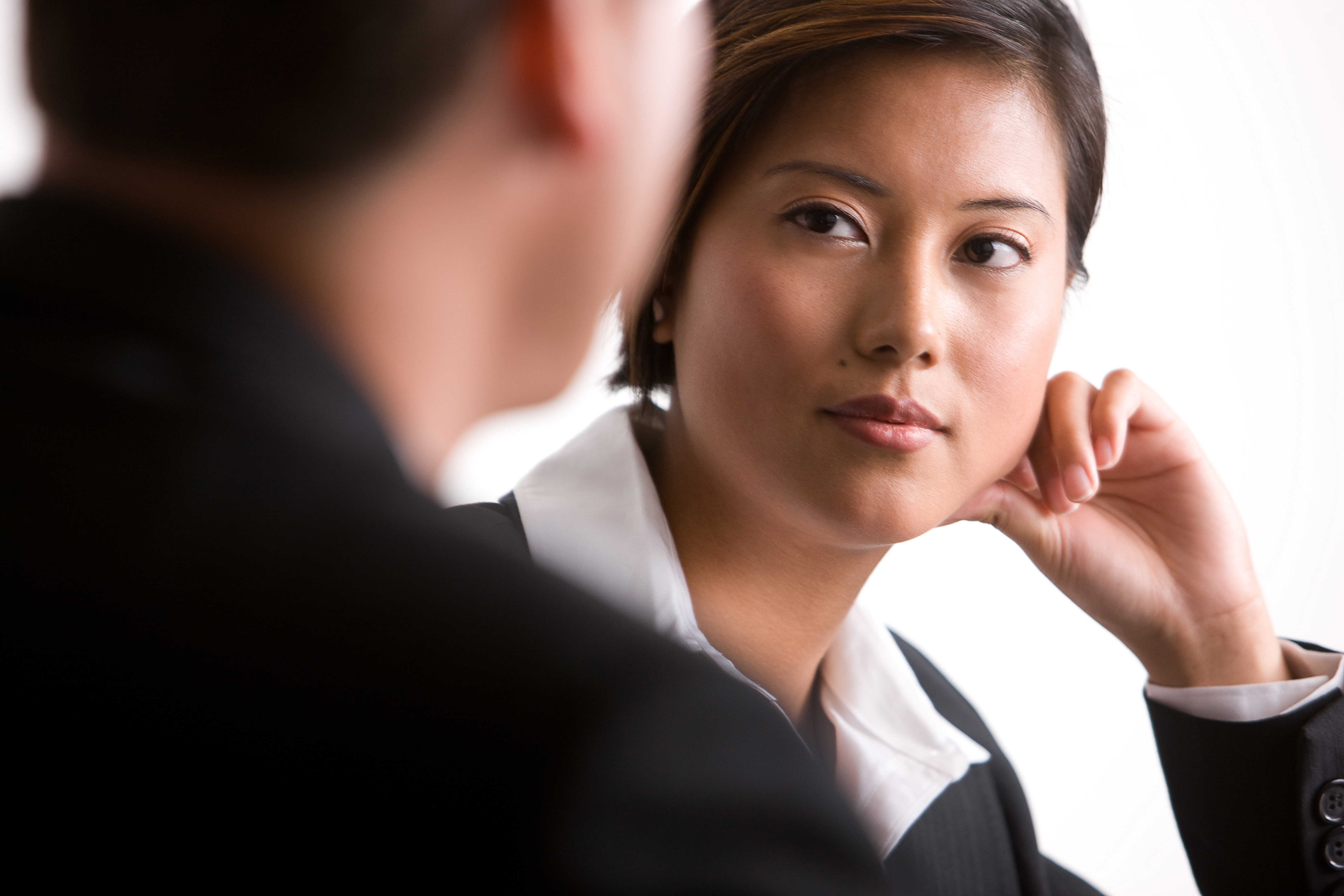 Businesswoman Watching Colleague